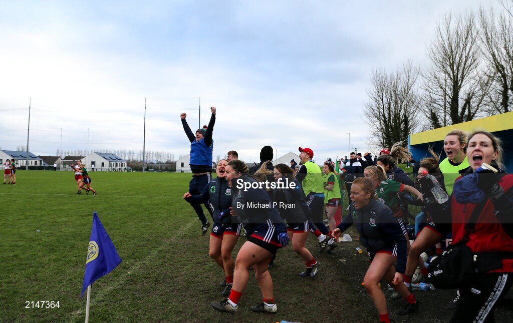 23 January 2022; Mullinahone manager Paul Kelly and players celebrate at the final whistle during the 2021 currentaccount.ie All-Ireland Ladies Junior Club Football Championship Semi-Final match between Mullinahone, Tipperary and St Brendan's, Galway at John Lockes GAA Club in Callan, Kilkenny. Photo by Michael P Ryan/Sportsfile