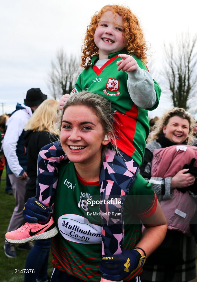 23 January 2022; Holly Carroll of Mullinahone celebrates with her cousin Caoimhe Hally age 5, after the 2021 currentaccount.ie All-Ireland Ladies Junior Club Football Championship Semi-Final match between Mullinahone, Tipperary and St Brendan's, Galway at John Lockes GAA Club in Callan, Kilkenny. Photo by Michael P Ryan/Sportsfile