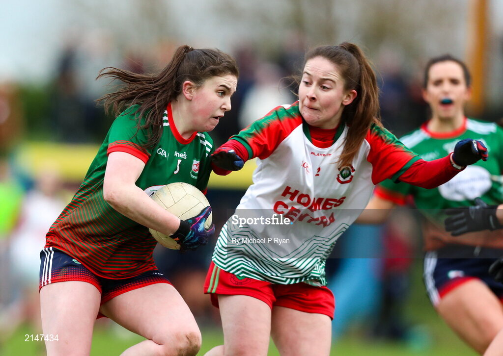 23 January 2022; Emma Cody of Mullinahone in action against Sarah Kelly of St Brendan's during the 2021 currentaccount.ie All-Ireland Ladies Junior Club Football Championship Semi-Final match between Mullinahone, Tipperary and St Brendan's, Galway at John Lockes GAA Club in Callan, Kilkenny. Photo by Michael P Ryan/Sportsfile