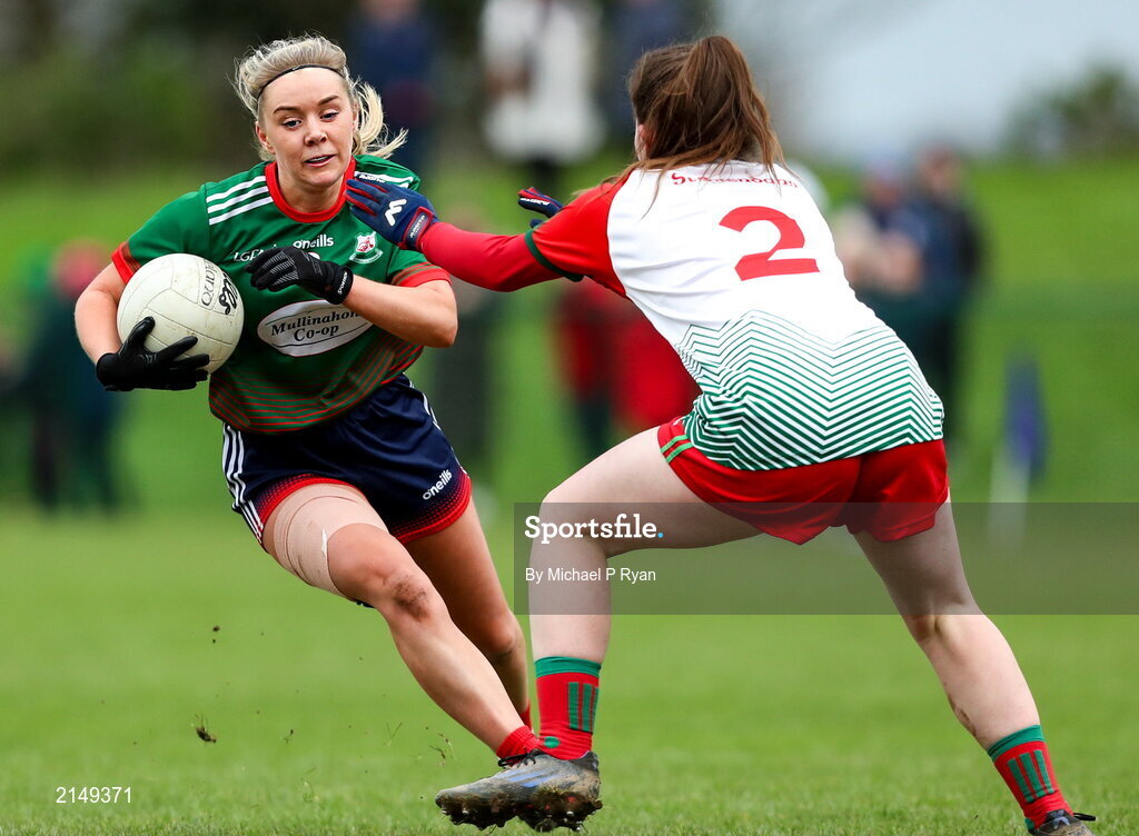 23 January 2022; Aoibhe O' Shea of Mullinahone in action against Sarah Kelly of St Brendan's during the 2021 currentaccount.ie All-Ireland Ladies Junior Club Football Championship Semi-Final match between Mullinahone, Tipperary and St Brendan's, Galway at John Lockes GAA Club in Callan, Kilkenny. Photo by Michael P Ryan/Sportsfile