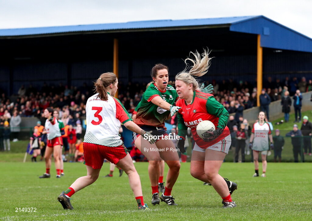 23 January 2022; St Brendan's goalkeeper Sinead Kelly in action against Lorraine O' Shea of Mullinahone during the 2021 currentaccount.ie All-Ireland Ladies Junior Club Football Championship Semi-Final match between Mullinahone, Tipperary and St Brendan's, Galway at John Lockes GAA Club in Callan, Kilkenny. Photo by Michael P Ryan/Sportsfile