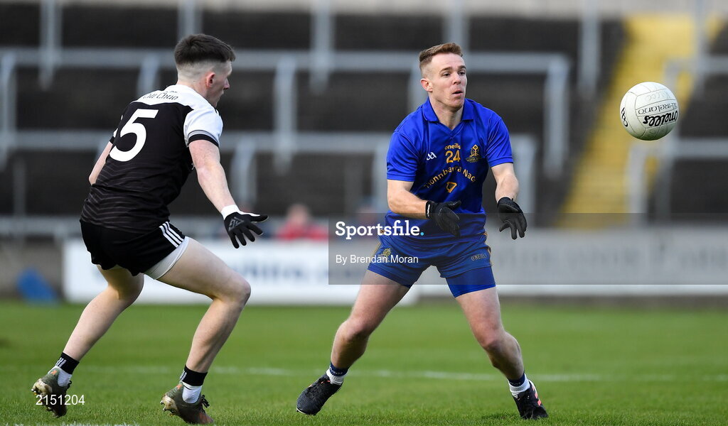 29 January 2022; Eoin McGreevey of St Finbarr's in action against Miceal Rooney of Kilcoo during the AIB GAA Football All-Ireland Senior Club Championship Semi-Final match between St Finbarr's, Cork, and Kilcoo, Down, at MW Hire O'Moore Park in Portlaoise, Laois. Photo by Brendan Moran/Sportsfile