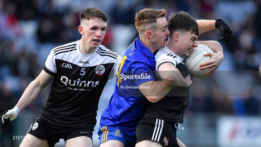 29 January 2022; Ceilum Docherty of Kilcoo is tackled by Eoin McGreevey of St Finbarr's during the AIB GAA Football All-Ireland Senior Club Championship Semi-Final match between St Finbarr's, Cork, and Kilcoo, Down, at MW Hire O'Moore Park in Portlaoise, Laois. Photo by Brendan Moran/Sportsfile