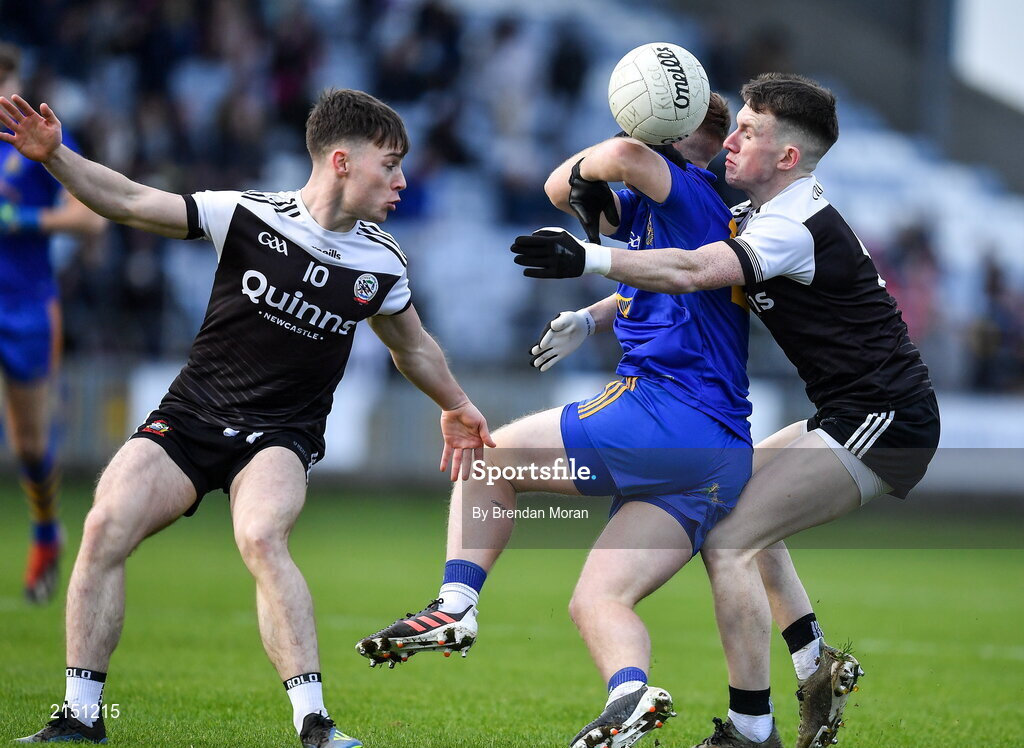 29 January 2022; Eoin McGreevey of St Finbarr's is dispossessed by Miceal Rooney of Kilcoo, right, during the AIB GAA Football All-Ireland Senior Club Championship Semi-Final match between St Finbarr's, Cork, and Kilcoo, Down, at MW Hire O'Moore Park in Portlaoise, Laois. Photo by Brendan Moran/Sportsfile