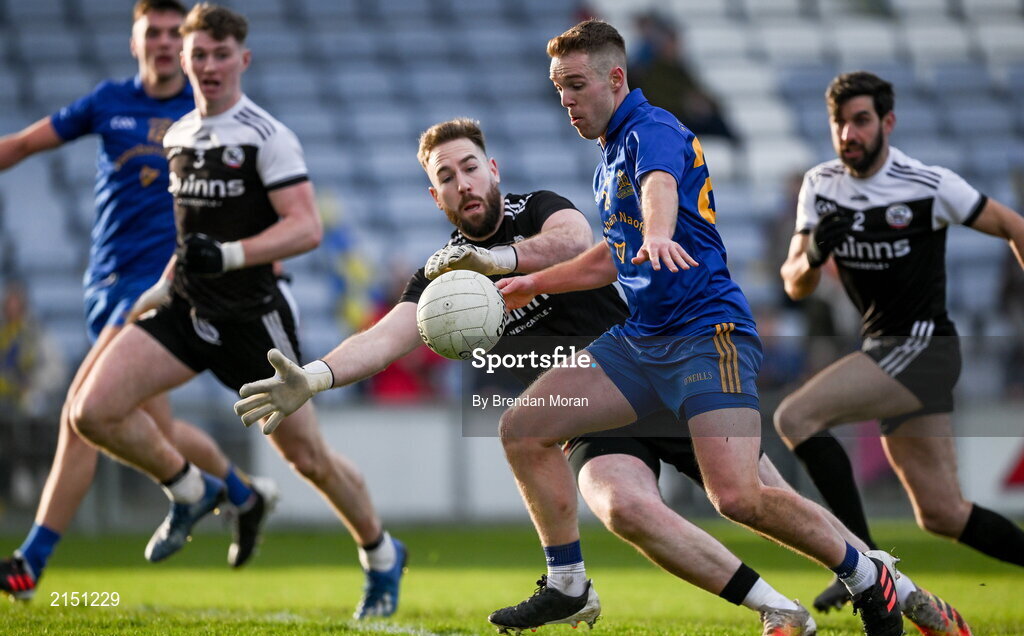 29 January 2022; Eoin McGreevey of St Finbarr's scores his side's first goal past Kilcoo goalkeeper Niall Kane during the AIB GAA Football All-Ireland Senior Club Championship Semi-Final match between St Finbarr's, Cork, and Kilcoo, Down, at MW Hire O'Moore Park in Portlaoise, Laois. Photo by Brendan Moran/Sportsfile