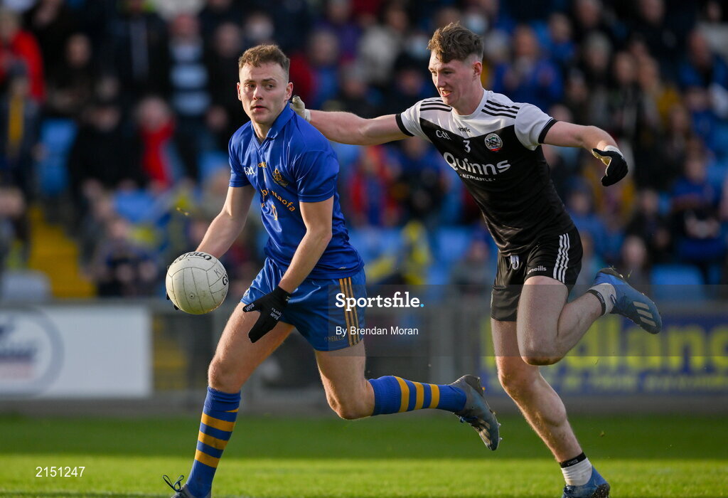 29 January 2022; Steven Sherlock of St Finbarr's in action against Felim McGreevy of Kilcoo during the AIB GAA Football All-Ireland Senior Club Championship Semi-Final match between St Finbarr's, Cork, and Kilcoo, Down, at MW Hire O'Moore Park in Portlaoise, Laois. Photo by Brendan Moran/Sportsfile