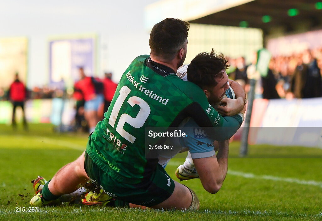 29 January 2022; Rufus McLean of Glasgow Warriors dives over to score his side's third try, despite the tackle of Connacht's Sammy Arnold, during the United Rugby Championship match between Connacht and Glasgow Warriors at the Sportsground in Galway. Photo by Seb Daly/Sportsfile