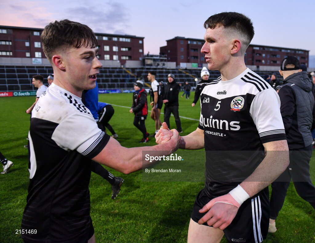 29 January 2022; Ceilum Docherty, left, and Miceal Rooney of Kilcoo celebrate after the AIB GAA Football All-Ireland Senior Club Championship Semi-Final match between St Finbarr's, Cork, and Kilcoo, Down, at MW Hire O'Moore Park in Portlaoise, Laois. Photo by Brendan Moran/Sportsfile