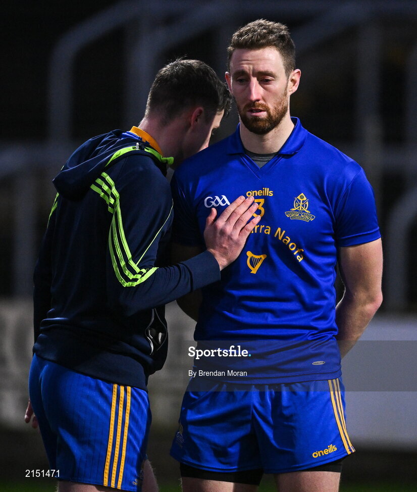 29 January 2022; Jamie Burns of St Finbarr's is consoled after the AIB GAA Football All-Ireland Senior Club Championship Semi-Final match between St Finbarr's, Cork, and Kilcoo, Down, at MW Hire O'Moore Park in Portlaoise, Laois. Photo by Brendan Moran/Sportsfile