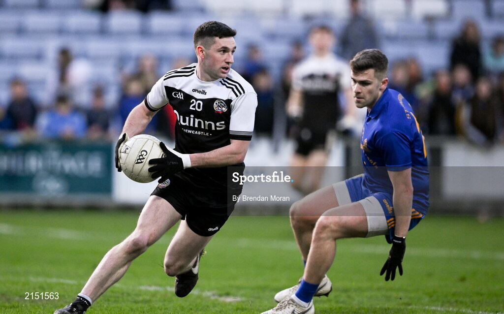 29 January 2022; Daryl Branagan of Kilcoo in action against Adam Lyne of St Finbarr's during the AIB GAA Football All-Ireland Senior Club Championship Semi-Final match between St Finbarr's, Cork, and Kilcoo, Down, at MW Hire O'Moore Park in Portlaoise, Laois. Photo by Brendan Moran/Sportsfile