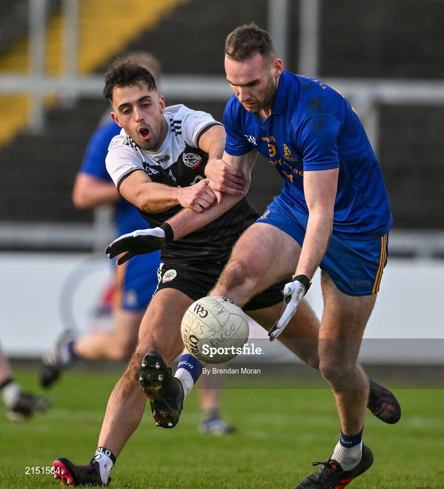29 January 2022; Eoin Comyns of St Finbarr's in action against Ryan Johnston of Kilcoo during the AIB GAA Football All-Ireland Senior Club Championship Semi-Final match between St Finbarr's, Cork, and Kilcoo, Down, at MW Hire O'Moore Park in Portlaoise, Laois. Photo by Brendan Moran/Sportsfile