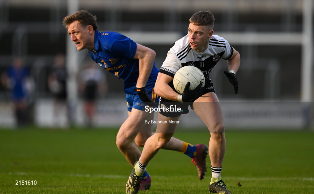 29 January 2022; Jerome Johnston of Kilcoo in action against Sam Ryan of St Finbarr's during the AIB GAA Football All-Ireland Senior Club Championship Semi-Final match between St Finbarr's, Cork, and Kilcoo, Down, at MW Hire O'Moore Park in Portlaoise, Laois. Photo by Brendan Moran/Sportsfile