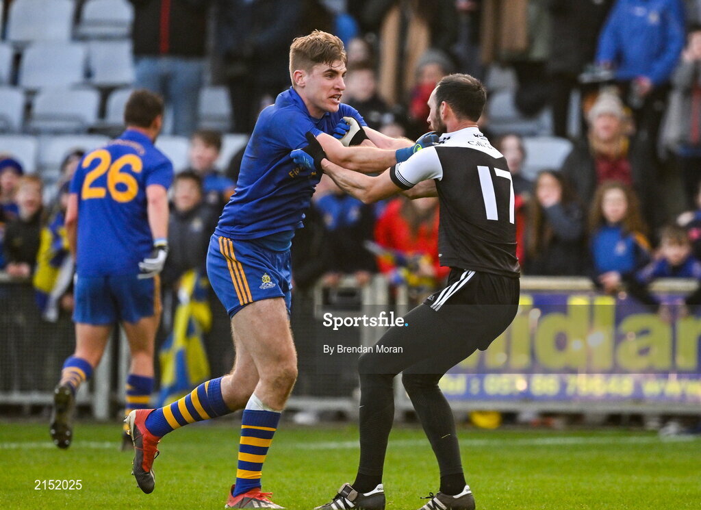 29 January 2022; Ian Maguire of St Finbarr's and Aidan Branagan of Kilcoo tussle off the ball during the AIB GAA Football All-Ireland Senior Club Championship Semi-Final match between St Finbarr's, Cork, and Kilcoo, Down, at MW Hire O'Moore Park in Portlaoise, Laois. Photo by Brendan Moran/Sportsfile