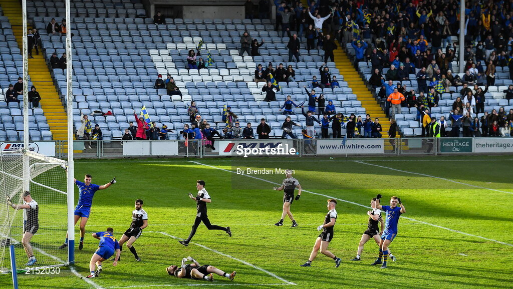 29 January 2022; St Finbarr's players and supporters celebrate after Eoin McGreevey scored their side's first goal during the AIB GAA Football All-Ireland Senior Club Championship Semi-Final match between St Finbarr's, Cork, and Kilcoo, Down, at MW Hire O'Moore Park in Portlaoise, Laois. Photo by Brendan Moran/Sportsfile