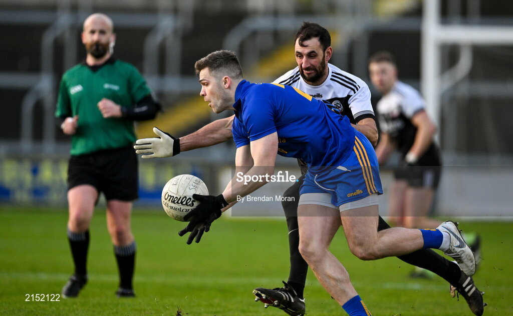 29 January 2022; Adam Lyne of St Finbarr's in action against Aidan Branagan of Kilcoo during the AIB GAA Football All-Ireland Senior Club Championship Semi-Final match between St Finbarr's, Cork, and Kilcoo, Down, at MW Hire O'Moore Park in Portlaoise, Laois. Photo by Brendan Moran/Sportsfile