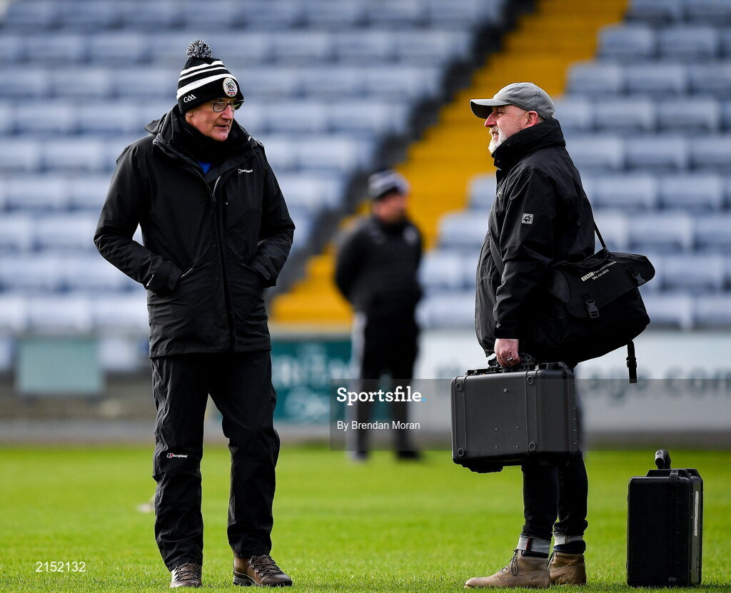 29 January 2022; Kilcoo manager Mickey Moran, left, in conversation with BBC journalist Mark Sidebottom before the AIB GAA Football All-Ireland Senior Club Championship Semi-Final match between St Finbarr's, Cork, and Kilcoo, Down, at MW Hire O'Moore Park in Portlaoise, Laois. Photo by Brendan Moran/Sportsfile