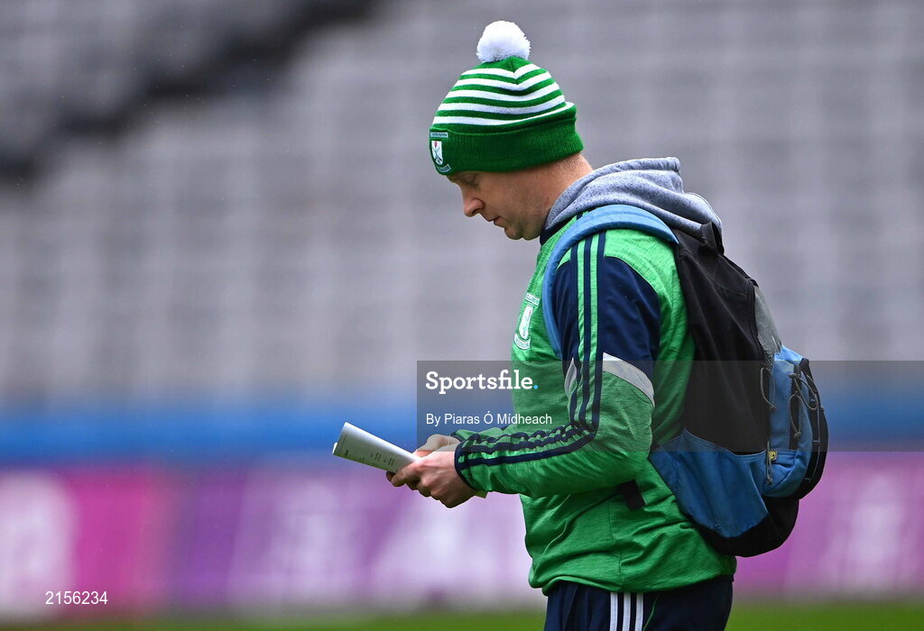 5 February 2022; Mooncoin manager Willie Coogan reads the match programme before the AIB GAA Hurling All-Ireland Junior Club Championship Final match between Ballygiblin, Cork, and Mooncoin, Kilkenny, at Croke Park in Dublin. Photo by Piaras Ó Mídheach/Sportsfile