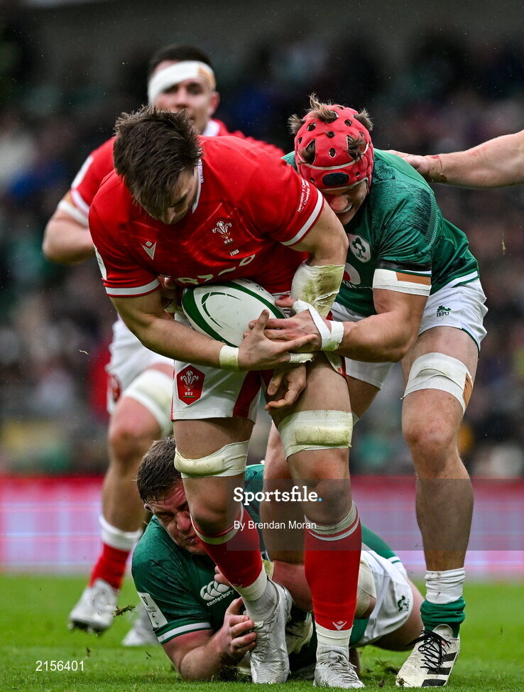 5 February 2022; Taine Basham of Wales is tackled by Tadhg Furlong, left, and Josh van der Flier of Ireland during the Guinness Six Nations Rugby Championship match between Ireland and Wales at the Aviva Stadium in Dublin. Photo by Brendan Moran/Sportsfile
