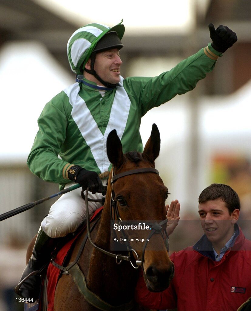 17 March 2004; Rule Supreme, with David Casey up, celebrates after winning the Royal & Sunalliance Steeple Chase, Cheltenham Festival, Prestbury Park, Cheltenham, England. Horse Racing. Picture credit; Damien Eagers / SPORTSFILE *EDI*
