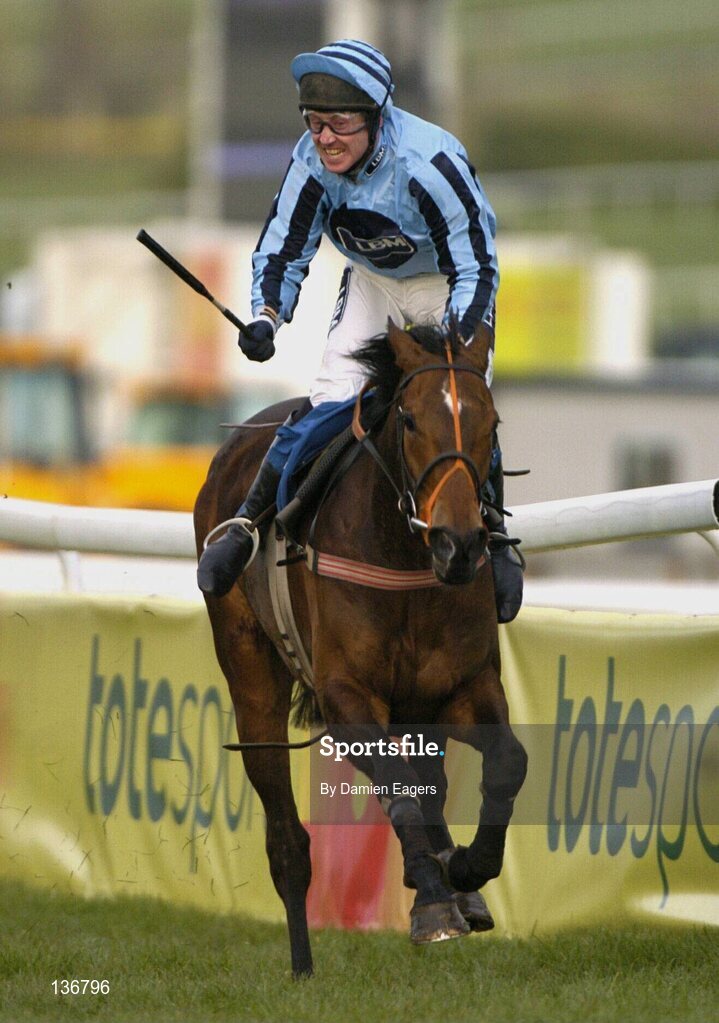 18 March 2004; Our Armageddon, with Larry McGrath up, celebrates after winning the Cathcart Challenge Cup Steeple Chase, Cheltenham Festival, Prestbury Park, Cheltenham, England. Horse Racing. Picture credit; Damien Eagers / SPORTSFILE *EDI*
