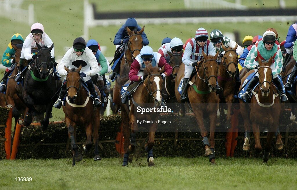 17 March 2004; The runners and riders during the Coral Cup, Cheltenham Festival, Prestbury Park, Cheltenham, England. Horse Racing. Picture credit; Damien Eagers / SPORTSFILE *EDI*