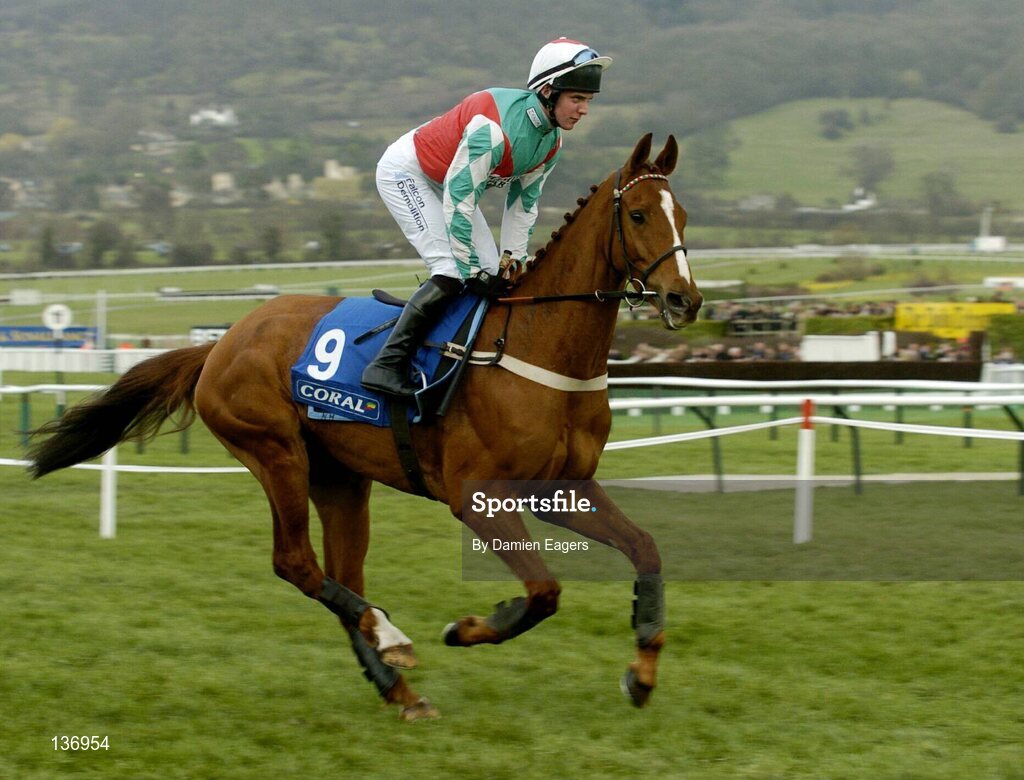 17 March 2004; Mon Villez, with Adrian Tinkler up, canters to the start for the Coral Cup, Cheltenham Festival, Prestbury Park, Cheltenham, England. Horse Racing. Picture credit; Damien Eagers / SPORTSFILE *EDI*