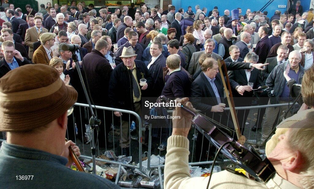17 March 2004; A band play to spectators at the Cheltenham festival, Prestbury Park, Cheltenham, England. Horse Racing. Picture credit; Damien Eagers / SPORTSFILE *EDI*