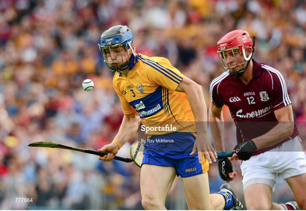 28 July 2013; David McInerney, Clare, in action against Jonathin Gavin, Galway. GAA Hurling All-Ireland Senior Championship, Quarter-Final, Galway v Clare, Semple Stadium, Thurles, Co. Tipperary. Picture credit: Ray McManus / SPORTSFILE