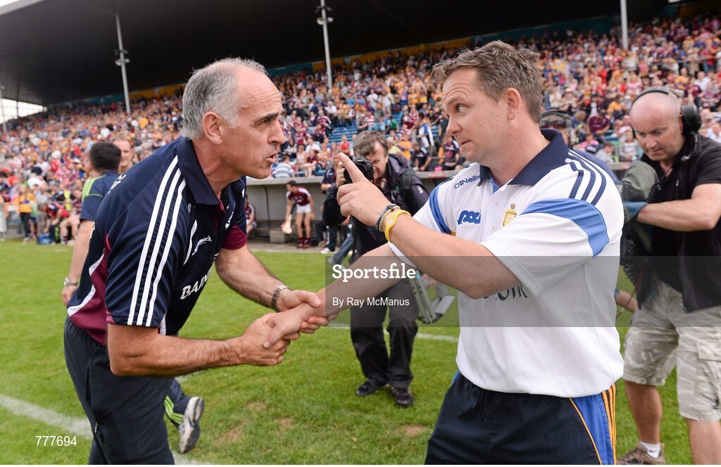 28 July 2013; Clare manager Davy Fitzgerald, right, and Galway manager Anthony Cunningham shake hands after the game. GAA Hurling All-Ireland Senior Championship, Quarter-Final, Galway v Clare, Semple Stadium, Thurles, Co. Tipperary. Picture credit: Ray McManus / SPORTSFILE