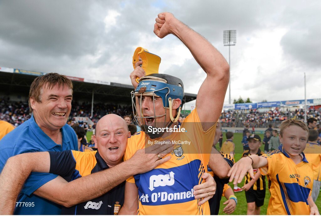 28 July 2013; Brendan Bugler, Clare, celebrates with supporters following their side's victory. GAA Hurling All-Ireland Senior Championship, Quarter-Final, Galway v Clare, Semple Stadium, Thurles, Co. Tipperary. Picture credit: Stephen McCarthy / SPORTSFILE