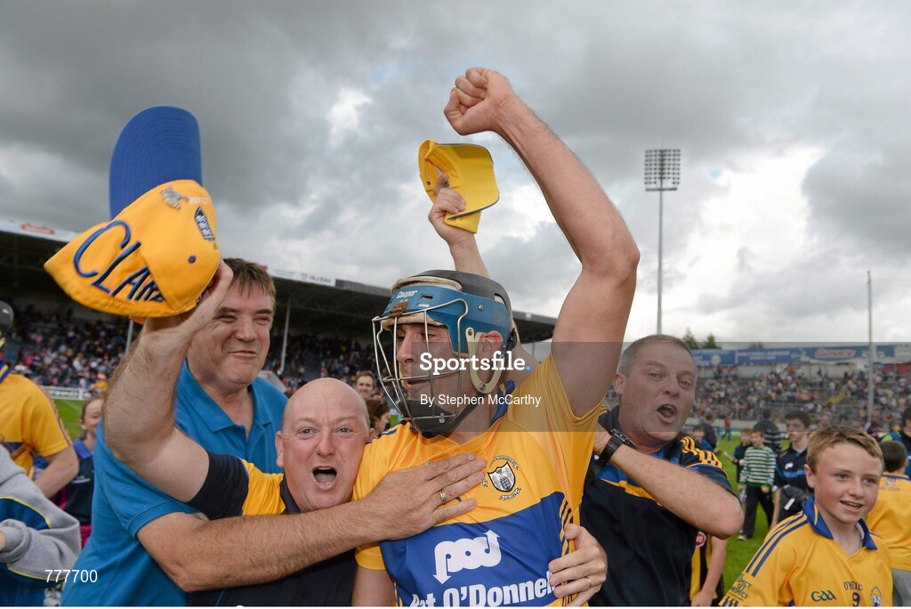28 July 2013; Brendan Bugler, Clare, celebrates with supporters following their side's victory. GAA Hurling All-Ireland Senior Championship, Quarter-Final, Galway v Clare, Semple Stadium, Thurles, Co. Tipperary. Picture credit: Stephen McCarthy / SPORTSFILE