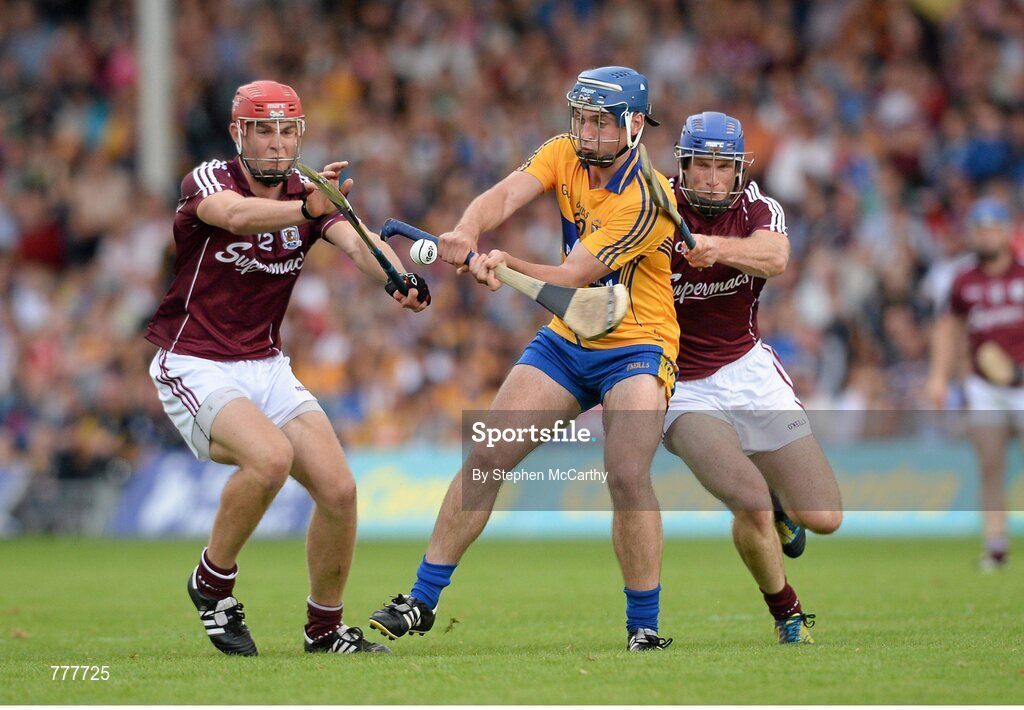 28 July 2013; Conor Ryan, Clare, in action against Jonathan Glynn, left, and James Regan, Galway. GAA Hurling All-Ireland Senior Championship, Quarter-Final, Galway v Clare, Semple Stadium, Thurles, Co. Tipperary. Picture credit: Stephen McCarthy / SPORTSFILE