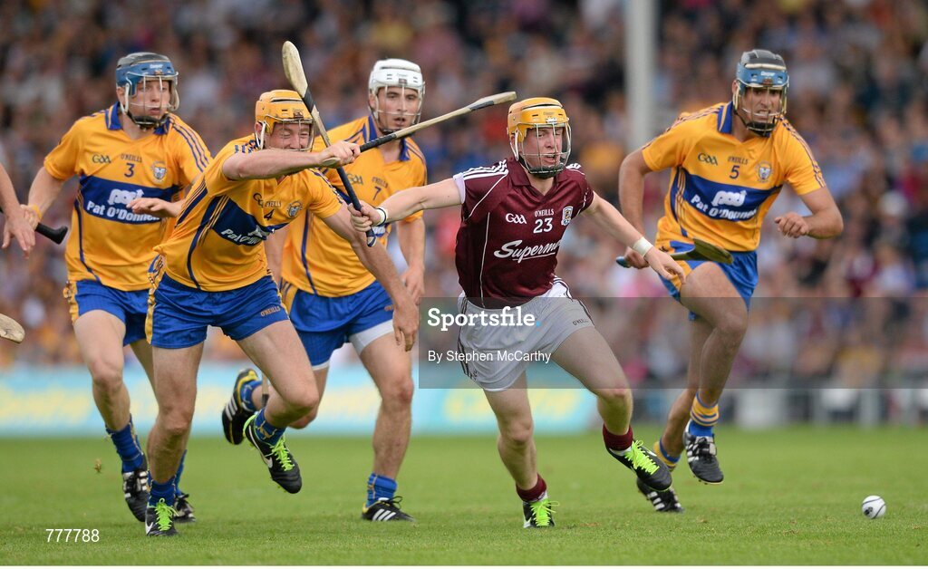 28 July 2013; David Glennon, Galway, in action against Clare players, from left, David McInerney, Cian Dillon, Patrick O'Connor and Brendan Bugler. GAA Hurling All-Ireland Senior Championship, Quarter-Final, Galway v Clare, Semple Stadium, Thurles, Co. Tipperary. Picture credit: Stephen McCarthy / SPORTSFILE