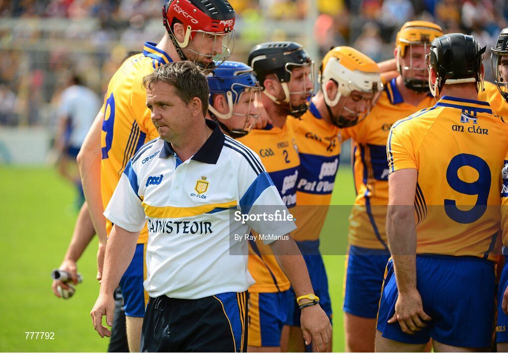 28 July 2013; Manager Davy Fitzgerald leave the Clare 'huddle' after speaking to the players before the start of the game. GAA Hurling All-Ireland Senior Championship, Quarter-Final, Galway v Clare, Semple Stadium, Thurles, Co. Tipperary. Picture credit: Ray McManus / SPORTSFILE