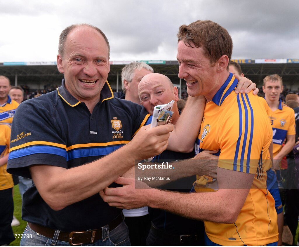 28 July 2013; Clare's Cian Dillon celebrates with supporters after the game. GAA Hurling All-Ireland Senior Championship, Quarter-Final, Galway v Clare, Semple Stadium, Thurles, Co. Tipperary. Picture credit: Ray McManus / SPORTSFILE