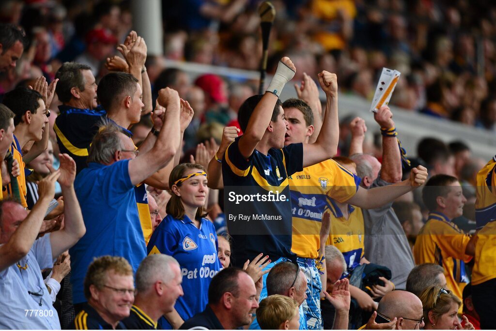 28 July 2013; Clare supporters celebrate a score. GAA Hurling All-Ireland Senior Championship, Quarter-Final, Galway v Clare, Semple Stadium, Thurles, Co. Tipperary. Picture credit: Ray McManus / SPORTSFILE