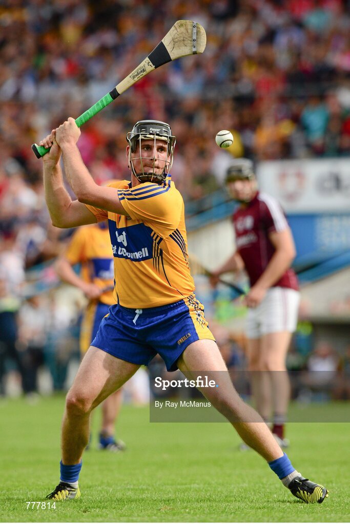 28 July 2013; Colin Ryan strikes a free for Clare. GAA Hurling All-Ireland Senior Championship, Quarter-Final, Galway v Clare, Semple Stadium, Thurles, Co. Tipperary. Picture credit: Ray McManus / SPORTSFILE