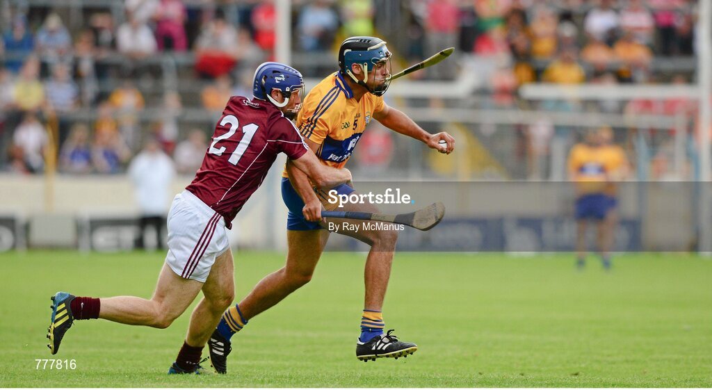 28 July 2013; Brendan Bugler, Clare, in action against Cyril Donnellan, Galway. GAA Hurling All-Ireland Senior Championship, Quarter-Final, Galway v Clare, Semple Stadium, Thurles, Co. Tipperary. Picture credit: Ray McManus / SPORTSFILE