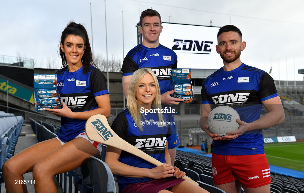 14 February 2022; An exciting new Irish protein cookies brand will hit shelves this month, endorsed by the GAA and GPA. East Coast Bakehouse have announced the launch of a new Irish Protein brand called In the Zone, created in partnership with the GAA and GPA as The Official Players Choice. The new range comprises of 4 tasty variants, two high protein low sugar cookies – Soft Bake Double Chocolate flavour and Soft Bake Cookies & Cream flavour, both with 20g of protein, as well as two high protein biscuits with 10g of protein – Crunchy Double Chocolate flavour and Crunchy Salted Caramel flavour. In attendance at the In the Zone – The Official Protein Cookies & Biscuits of the GAA & GPA Launch event at Croke Park in Dublin are, from left, Erika O'Shea of Cork, Sarah Dervan of Galway, Tony Kelly of Clare and Padraig Hampsey of Tyrone. Photo by Brendan Moran/Sportsfile