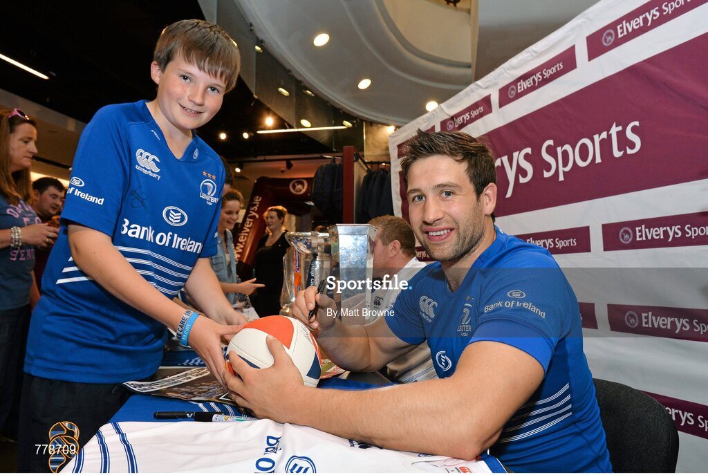 1 August 2013: Leinster's Kevin McLaughlin with Cian Maxwell, from Maynooth, Co. Kildare, at Canterbury's launch of the new Leinster 2013/14 jersey, hosted by Elverys Sports in Arnotts. Leinster will wear the new jersey in match action for the first time at home on Friday 30th August, when they come up against Northampton Saints in a friendly at the Donnybrook Stadium. Elverys Sports, Arnotts, Dublin. Picture credit: Matt Browne / SPORTSFILE