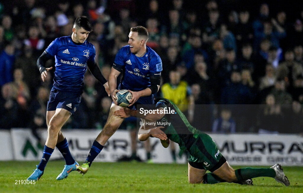 26 March 2022; Rory O'Loughlin of Leinster, supported by teammate Chris Cosgrave, is tackled by Tom Farrell of Connacht during the United Rugby Championship match between Connacht and Leinster at the Sportsground in Galway. Photo by Harry Murphy/Sportsfile