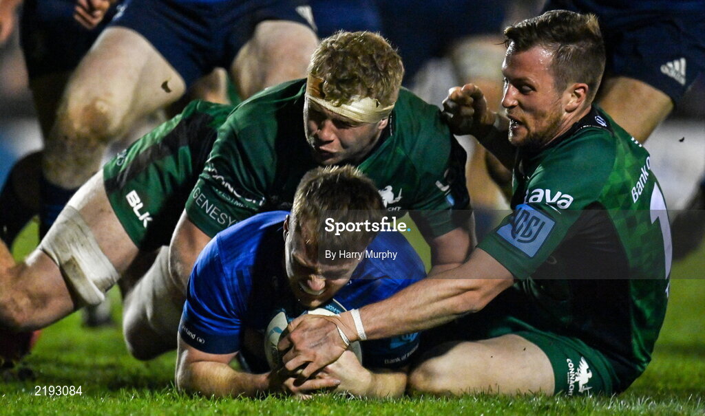 26 March 2022; David Hawkshaw of Leinster scores his side's second try despite the tackle of Niall Murray and Jack Carty of Connacht during the United Rugby Championship match between Connacht and Leinster at the Sportsground in Galway. Photo by Harry Murphy/Sportsfile