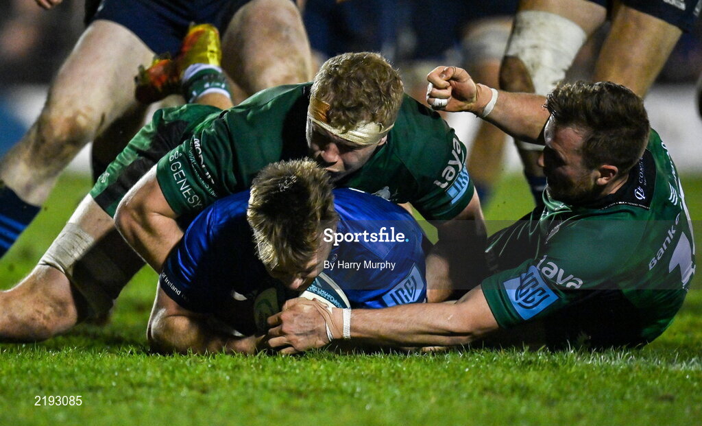 26 March 2022; David Hawkshaw of Leinster scores his side's second try despite the tackle of Niall Murray and Jack Carty of Connacht during the United Rugby Championship match between Connacht and Leinster at the Sportsground in Galway. Photo by Harry Murphy/Sportsfile