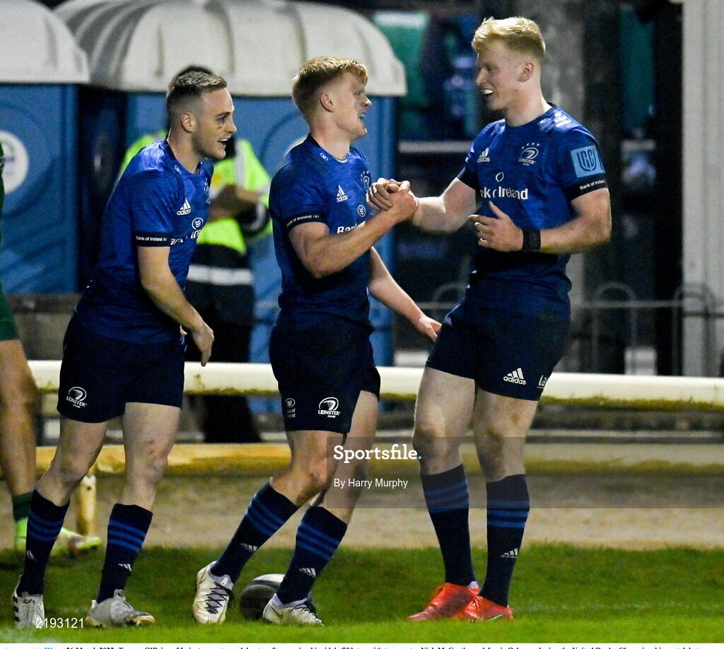 26 March 2022; Tommy O'Brien of Leinster, centre, celebrates after scoring his side's fifth try with teammates Nick McCarthy and Jamie Osborne during the United Rugby Championship match between Connacht and Leinster at the Sportsground in Galway. Photo by Harry Murphy/Sportsfile