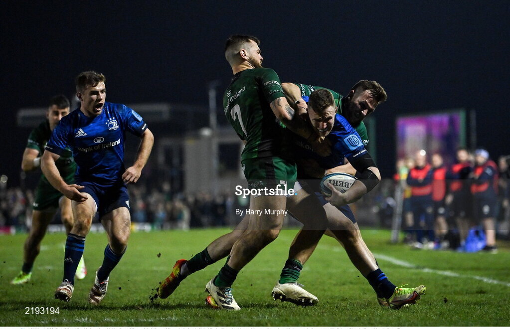 26 March 2022; Rory O'Loughlin of Leinster is tackled by Conor Oliver and Jack Carty of Connacht during the United Rugby Championship match between Connacht and Leinster at the Sportsground in Galway. Photo by Harry Murphy/Sportsfile
