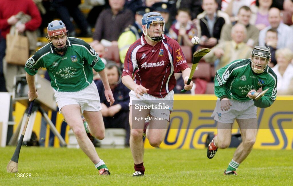 25 April 2004; Damien Hayes, Galway, in action against TJ Ryan, left, and Michael Cahill, Limerick. Allianz Hurling League 2004, Round 3, Division 1, Galway v Limerick, Pearse Stadium, Galway. Picture credit; Ray McManus / SPORTSFILE