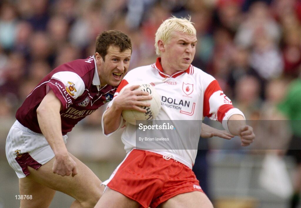 25 April 2004; Eoin Mulligan, Tyrone, in action against Gary Fahey, Galway. Allianz Football League 2004, Semi-Final Replay, Galway v Tyrone, Pearse Stadium, Galway. Picture credit; Brian Lawless / SPORTSFILE *EDI*