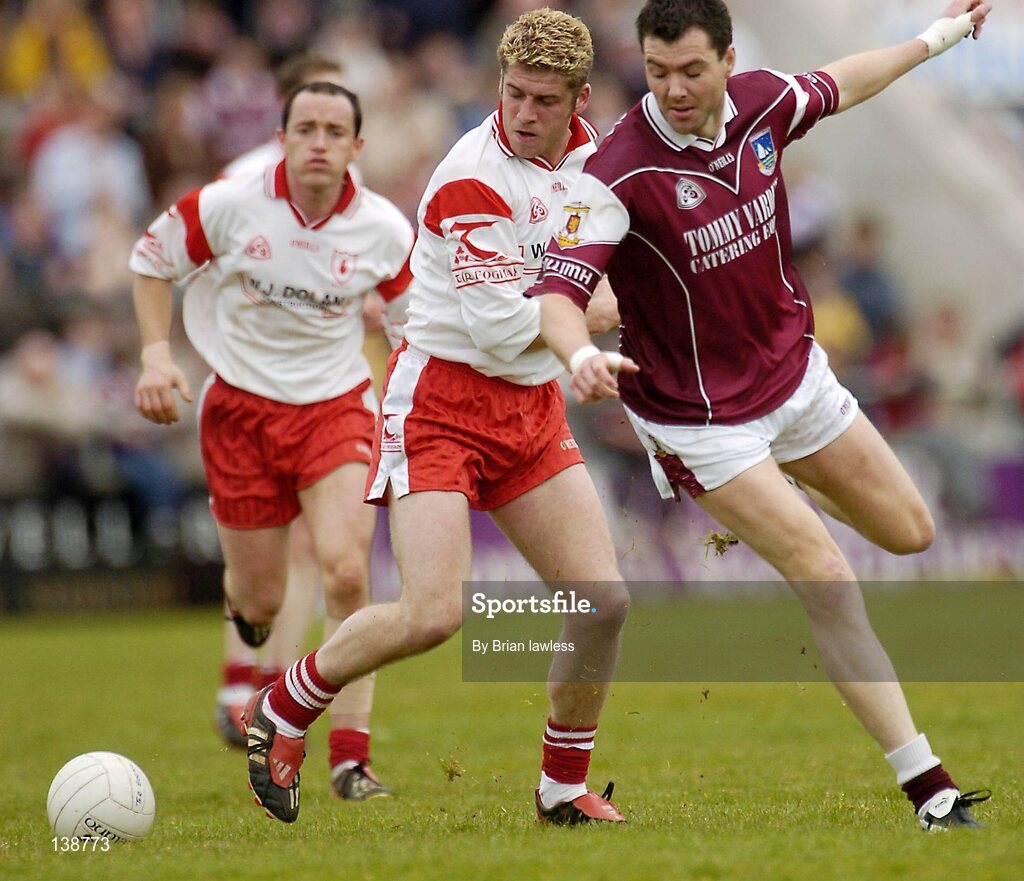 25 April 2004; Sean O'Domhnaill, Galway, in action against Kevin Hughes, Tyrone. Allianz Football League 2004, Semi-Final Replay, Galway v Tyrone, Pearse Stadium, Galway. Picture credit; Brian Lawless / SPORTSFILE *EDI*