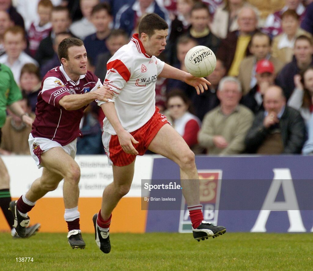 25 April 2004; Sean Cavanagh, Tyrone, in action against Derek Savage, Galway. Allianz Football League 2004, Semi-Final Replay, Galway v Tyrone, Pearse Stadium, Galway. Picture credit; Brian Lawless / SPORTSFILE *EDI*