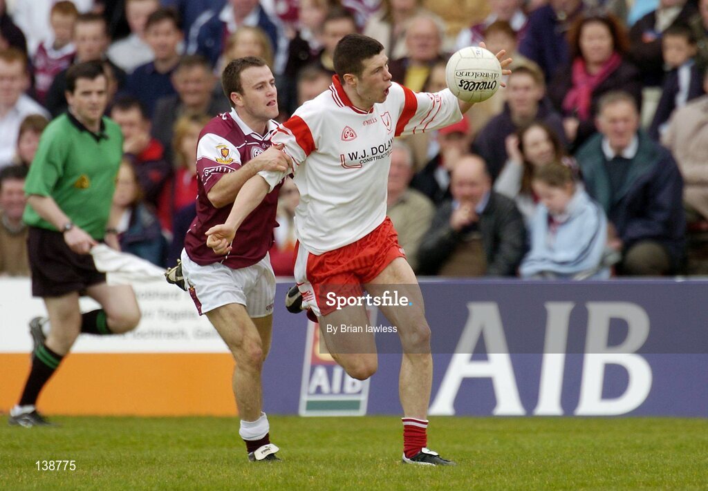 25 April 2004; Sean Cavanagh, Tyrone, in action against Derek Savage, Galway. Allianz Football League 2004, Semi-Final Replay, Galway v Tyrone, Pearse Stadium, Galway. Picture credit; Brian Lawless / SPORTSFILE *EDI*